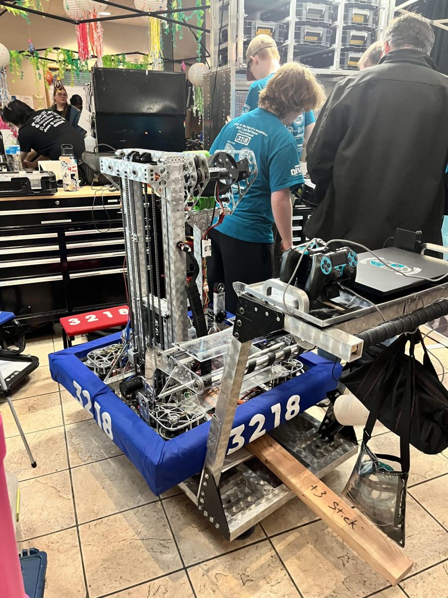 Each school has a designated pit in the Commons where viewers can watch teams with their robots. Typically, teams will also have souvenirs for visitors!